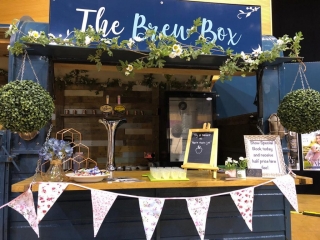 Close up of The Brew Box bar, decorated for a Wedding Show
